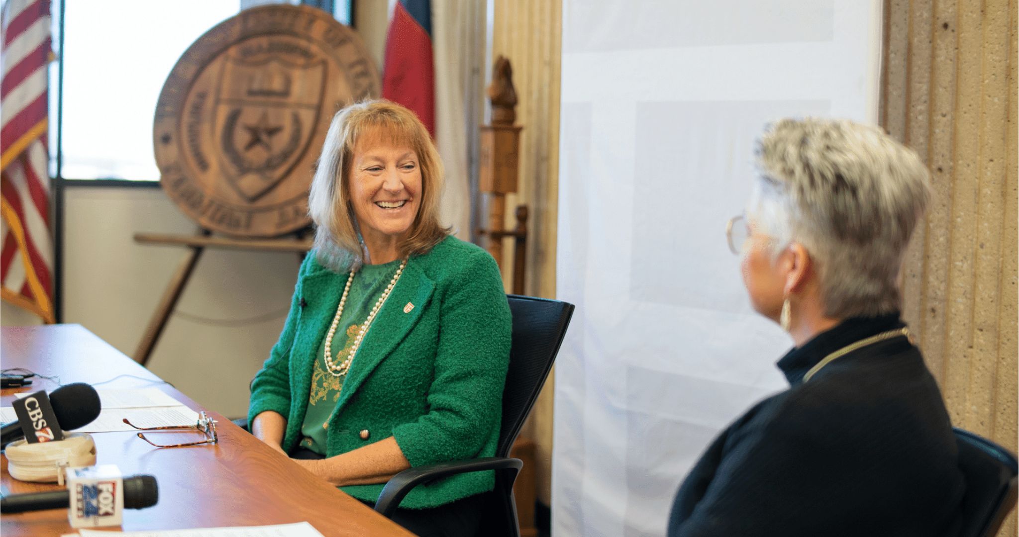 Susan Ganter sitting with Dr. Woodley