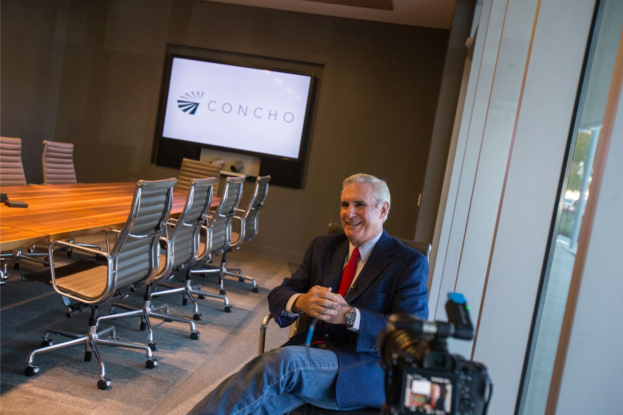 Tim Leah sitting in office