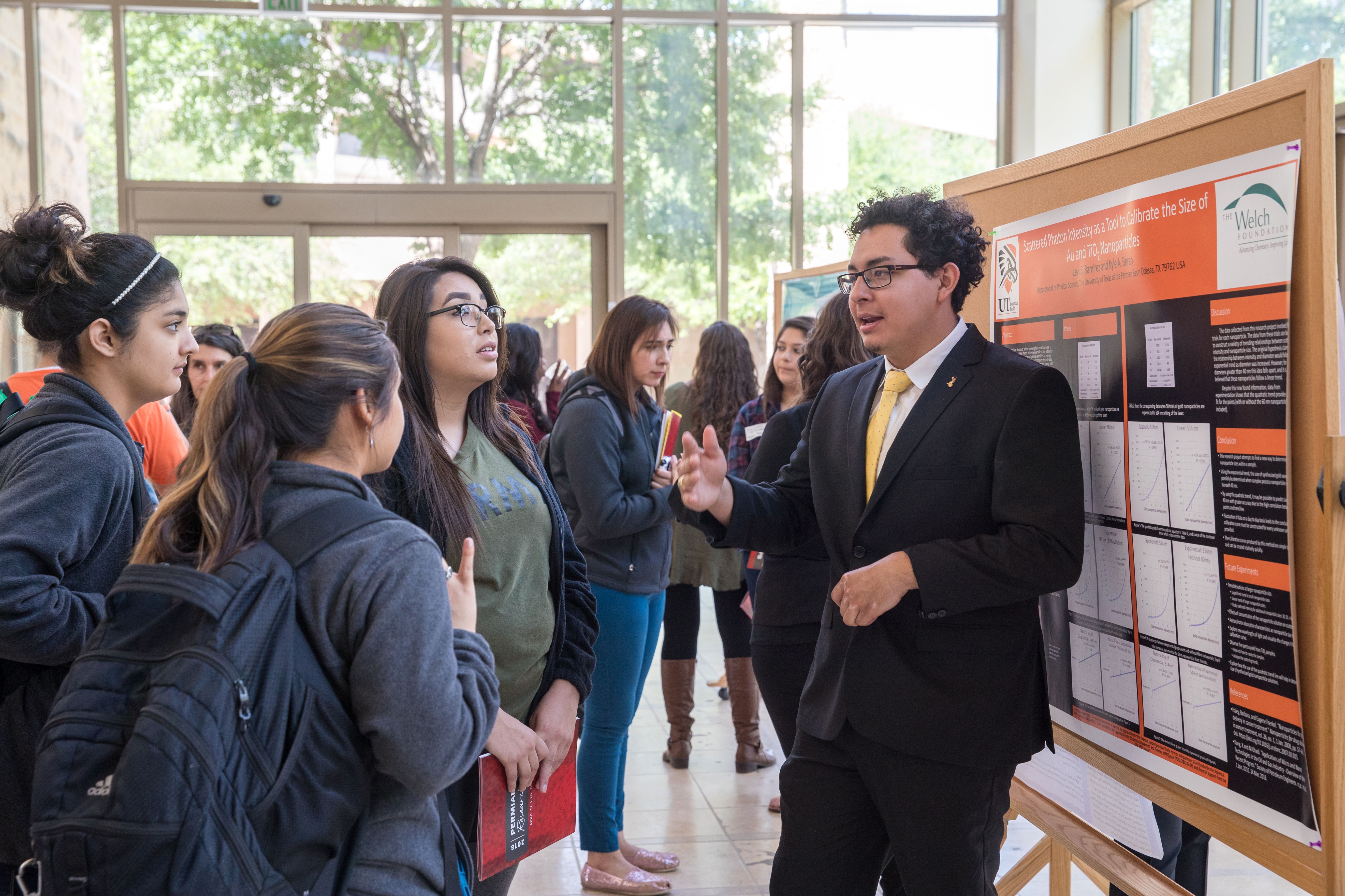 Student presenting poster at Undergraduate Research Day