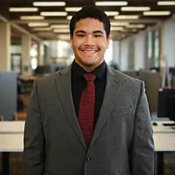 Aiden Pope at dress for success event